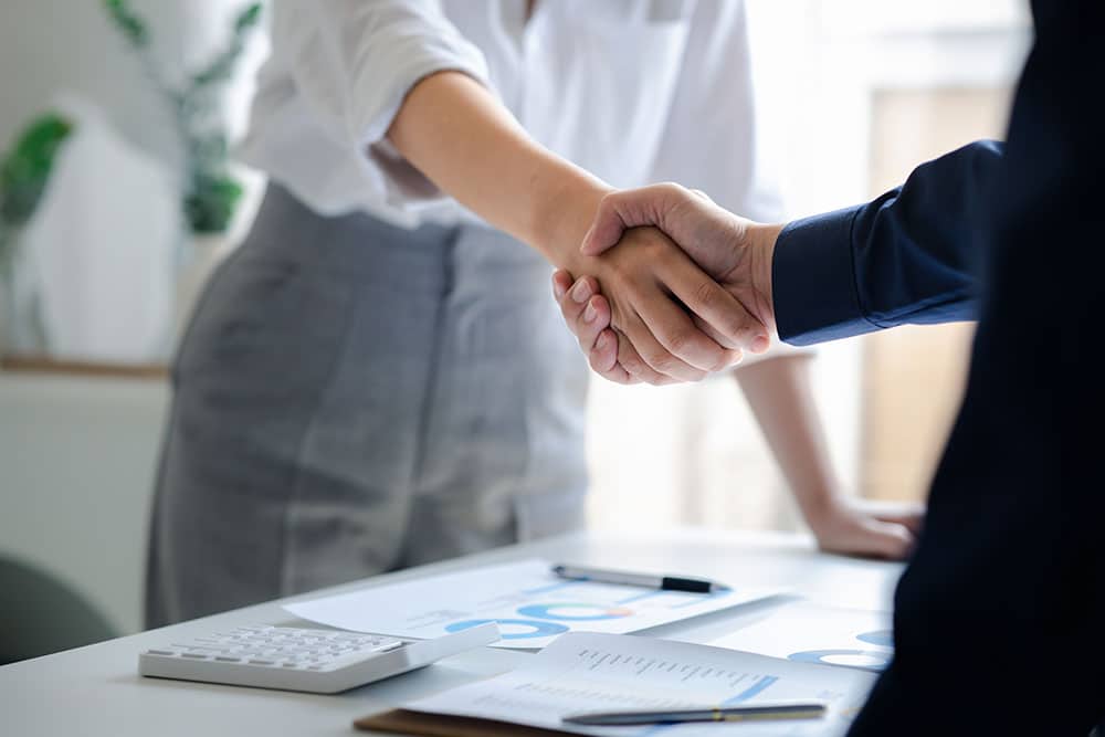 Two people shaking hands